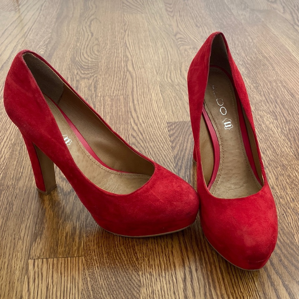 Red Aldo heels size 8.